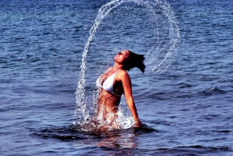 Bikini-clad woman swimming