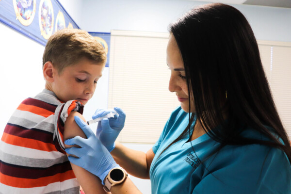 Child getting flu shot