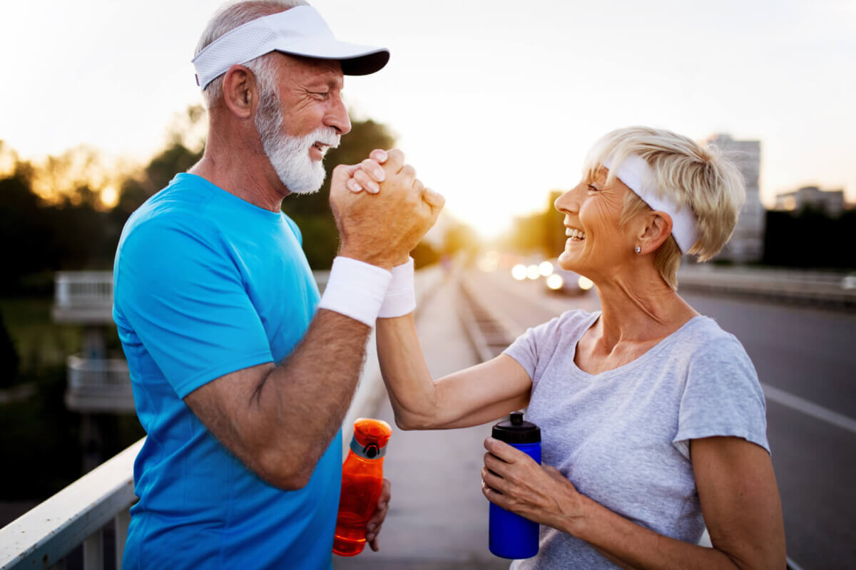 Active senior couple engaging in healthy sports activies