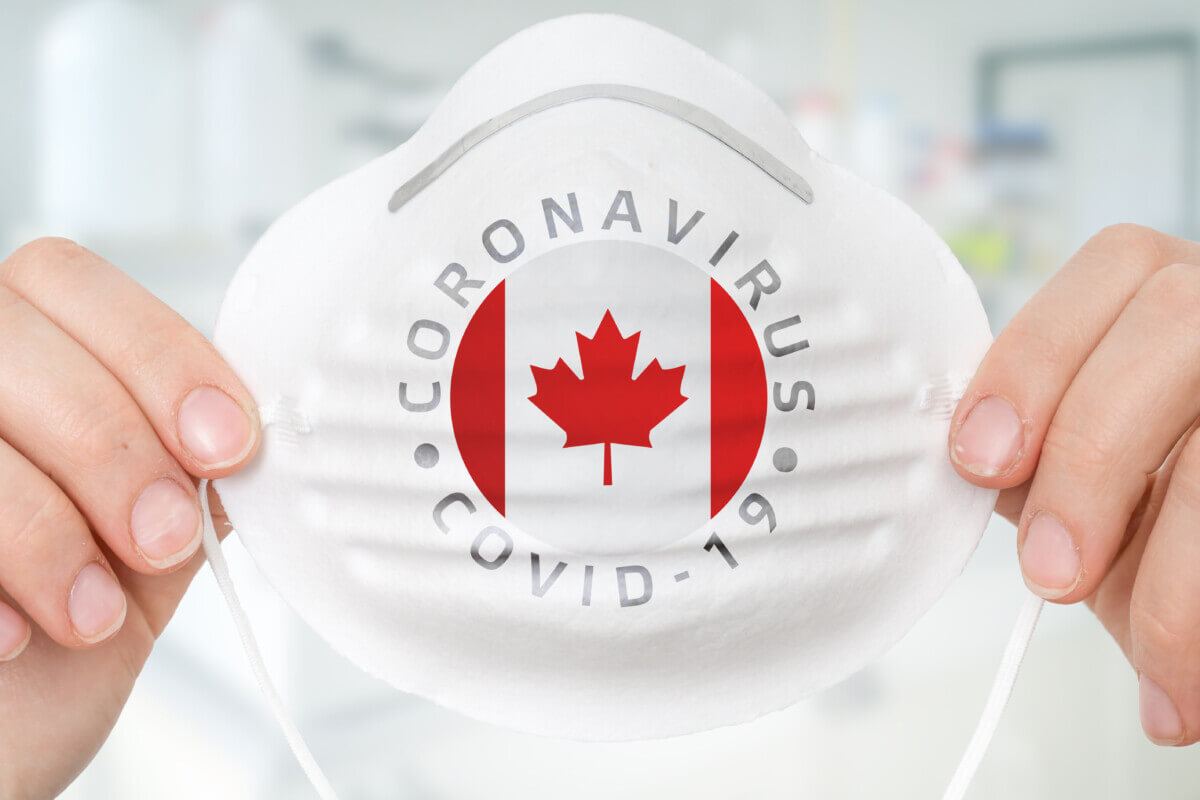 Respirator mask with flag of Canada - Coronavirus COVID-19 concept