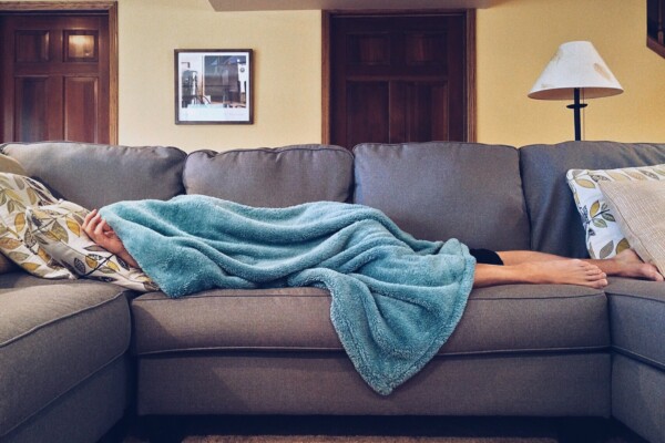 Person sleeping on couch