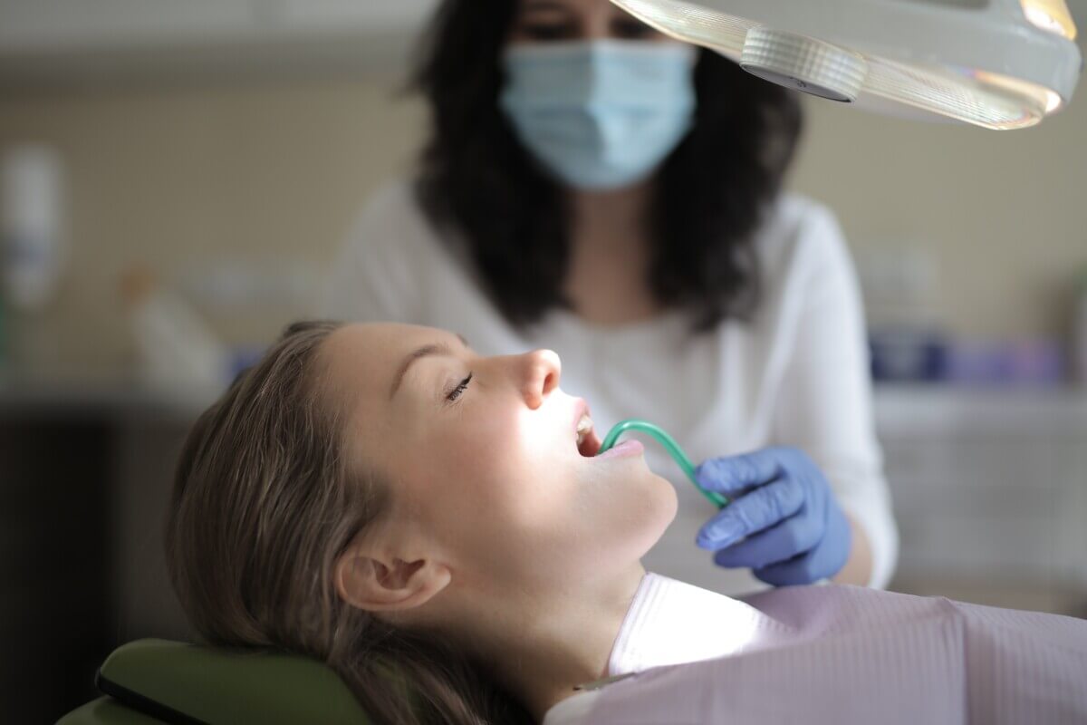 female-patient-healing-teeth-during-medical-procedure-in-3881430