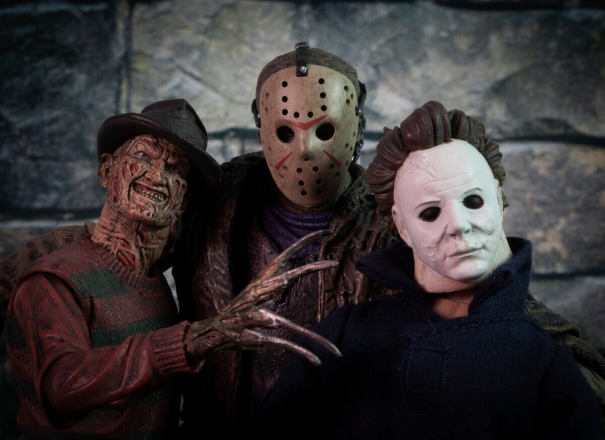 NEW YORK USA - JULY 30 2019: Friday the 13th slasher Jason Voorhees and Halloween Michael Myers , Nightmare on Elm Street Freddy Krueger - NECA Ultimate Jason and Freddy action figure - custom Myers