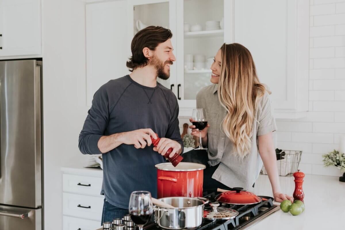 couple cooking kitchen