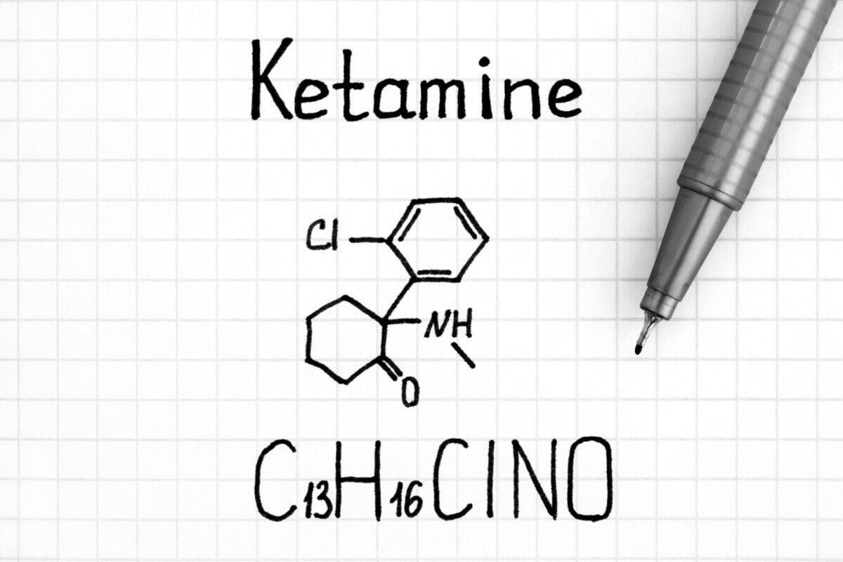 Handwriting Chemical formula of Ketamine with pen.