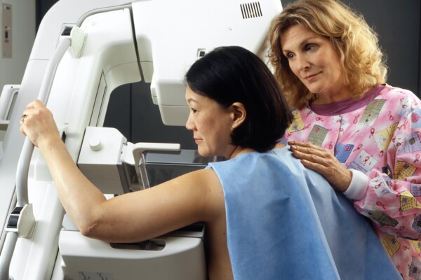 Woman undergoing a mammogram
