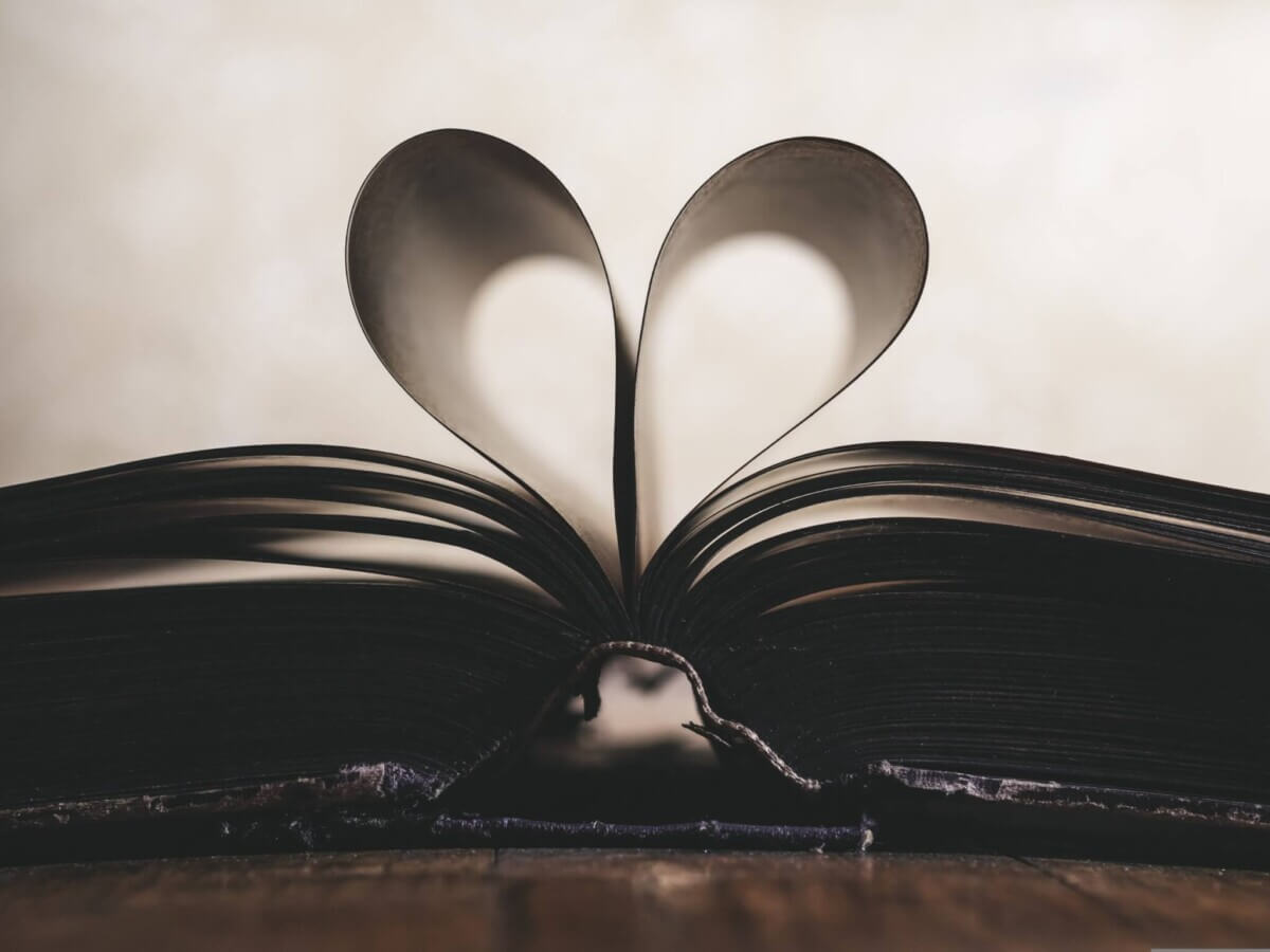 Romance novels: Book with pages folded into a heart