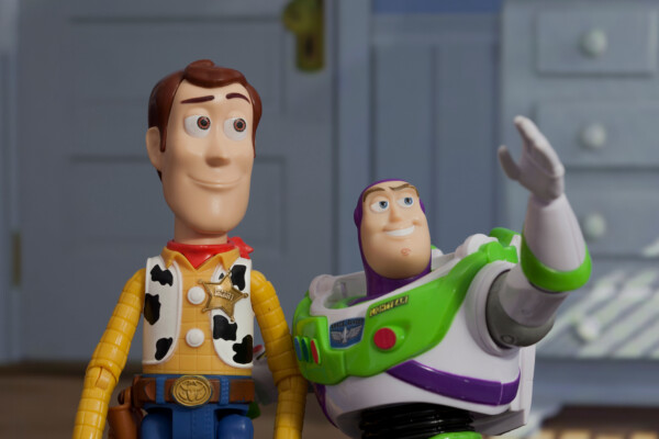 Recreation of a scene from Disney Pixar Toy Story with Buzz Lightyear and Woody - Disney Pixar action figure