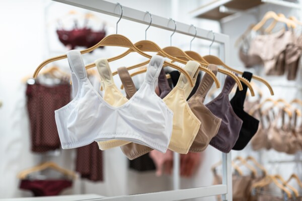 Bras on hangers at a clothing store