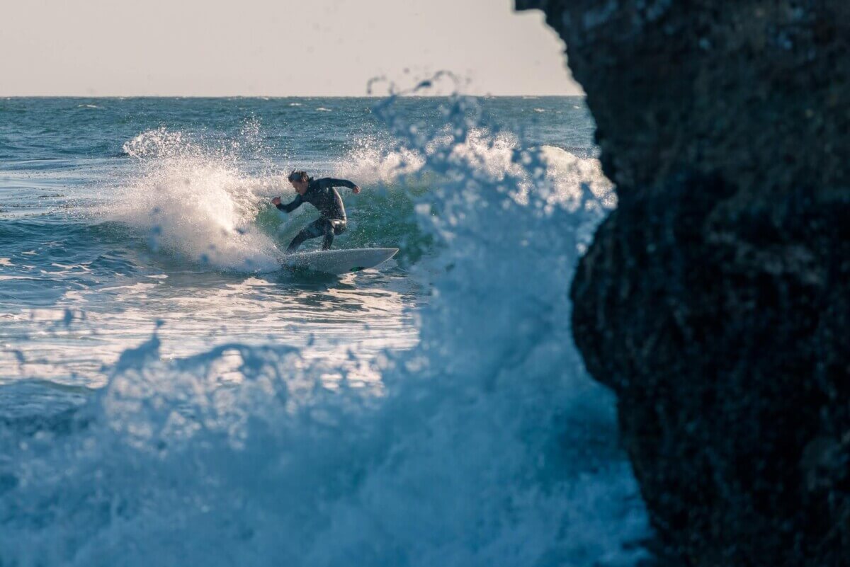 Surfer riding waves in Santa Cruz
