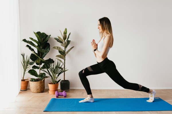 Woman doing yoga in leggings