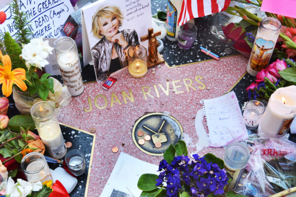 Joan Rivers' star on the Hollywood Walk of Fame is surrounded by flowers and various memorial tributes left by fans on September 6, 2014.