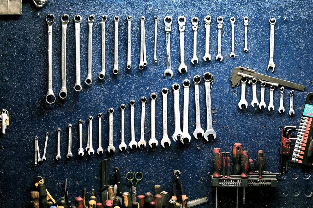 Set of tools hanging on wall
