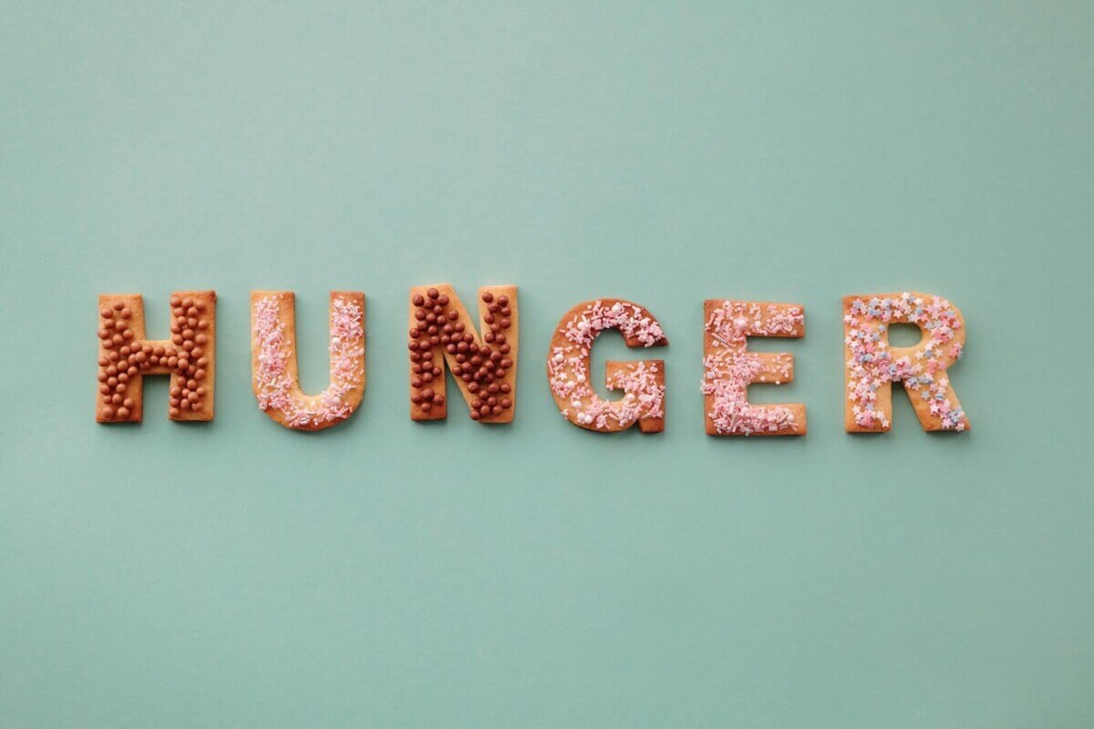 Hunger spelled out in food