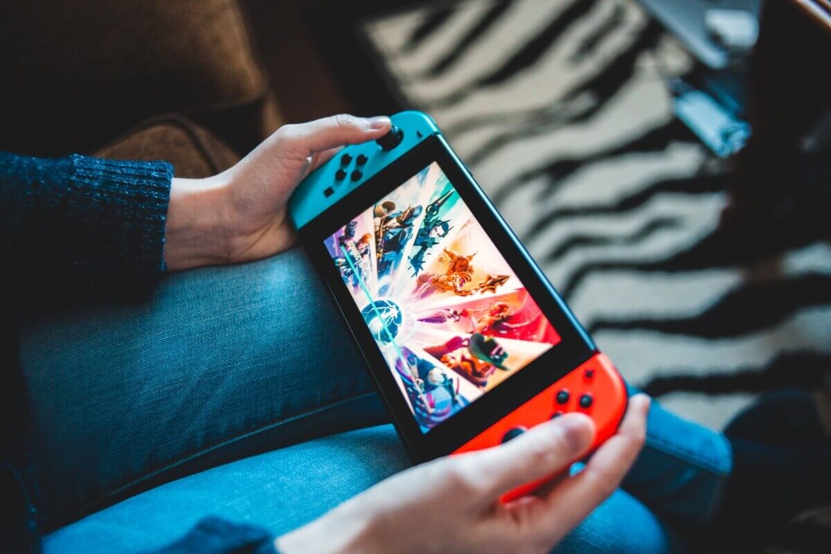 Person playing on a Nintendo Switch