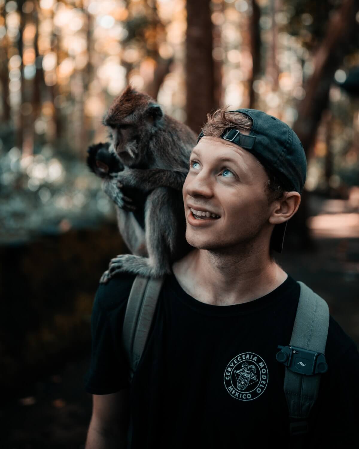 monkey on man's shoulder