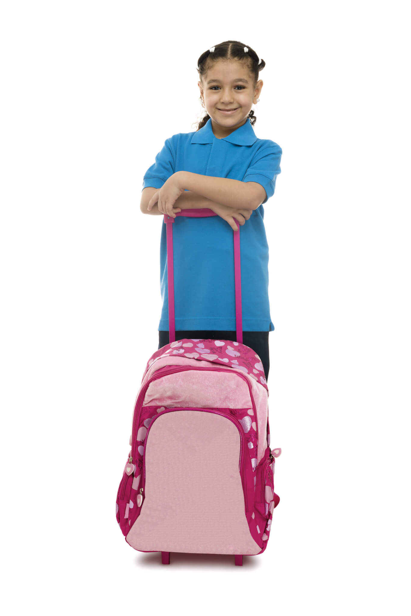 A little girl with a rolling backpack