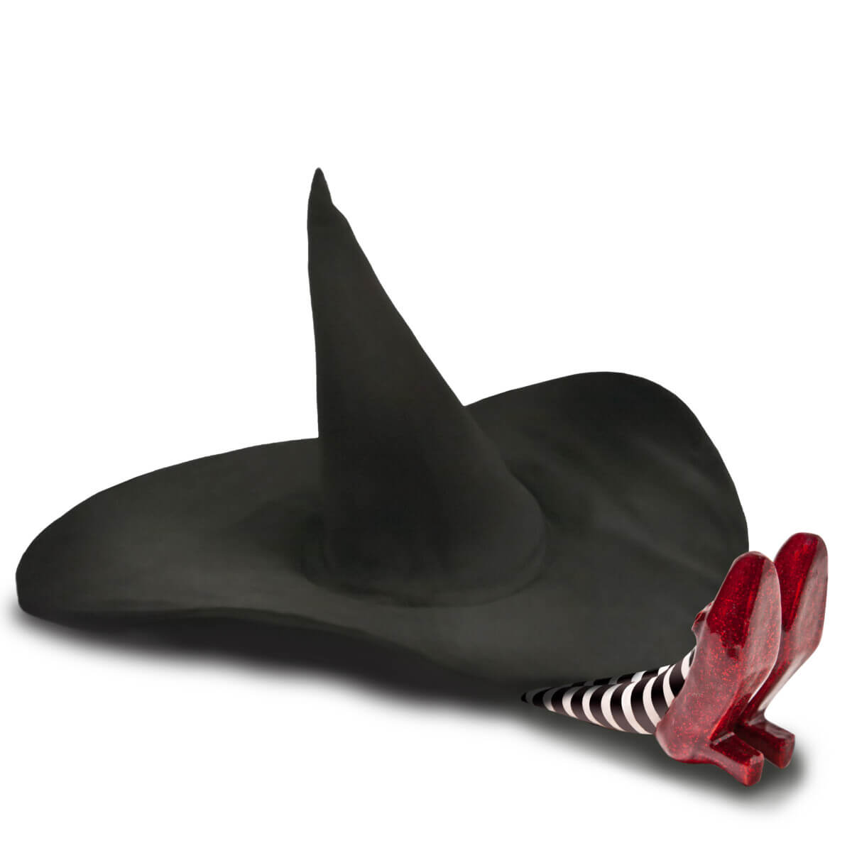 Ruby red slippers beneath a witch hat