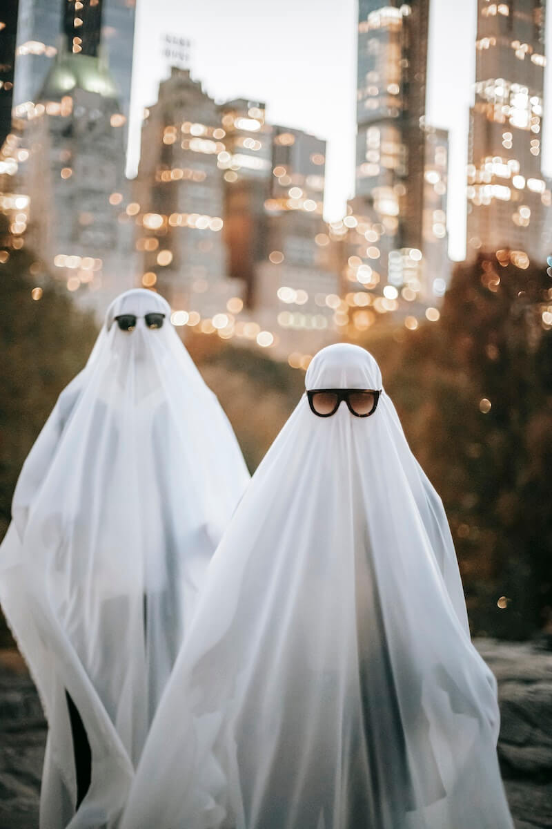 Couples dressed as ghosts