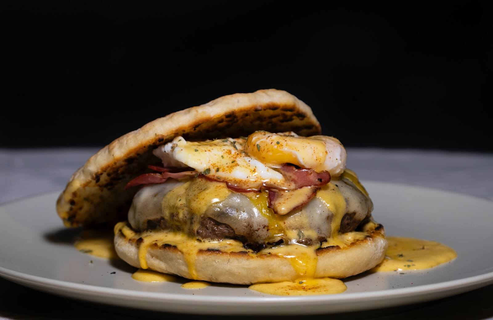 A breakfast sandwich with an English muffin