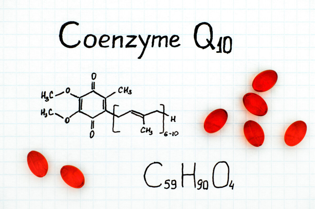 Chemical formula of Coenzyme Q10 with red pills.