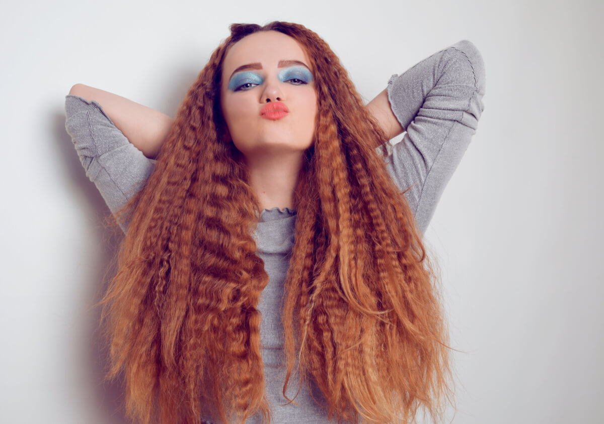 A woman with crimped hair