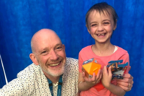 Professor Rob Wynn with Sarah, a young cancer patient