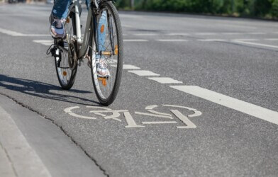 Bicyclist biking in a bike lane
